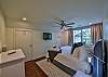 The third bedroom is located upstairs. There is a king bed and attached bathroom.