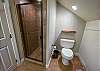The bathroom in the loft has a walk-in shower.