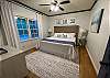 The second bedroom has a king bed. It has access to the bathroom down the hall.