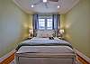 The third bedroom has a queen bed.