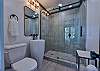The other bathroom has a walk-in shower