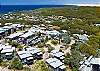 Aerial over the One Mile Ridge estate to Stockton Sand dunes 