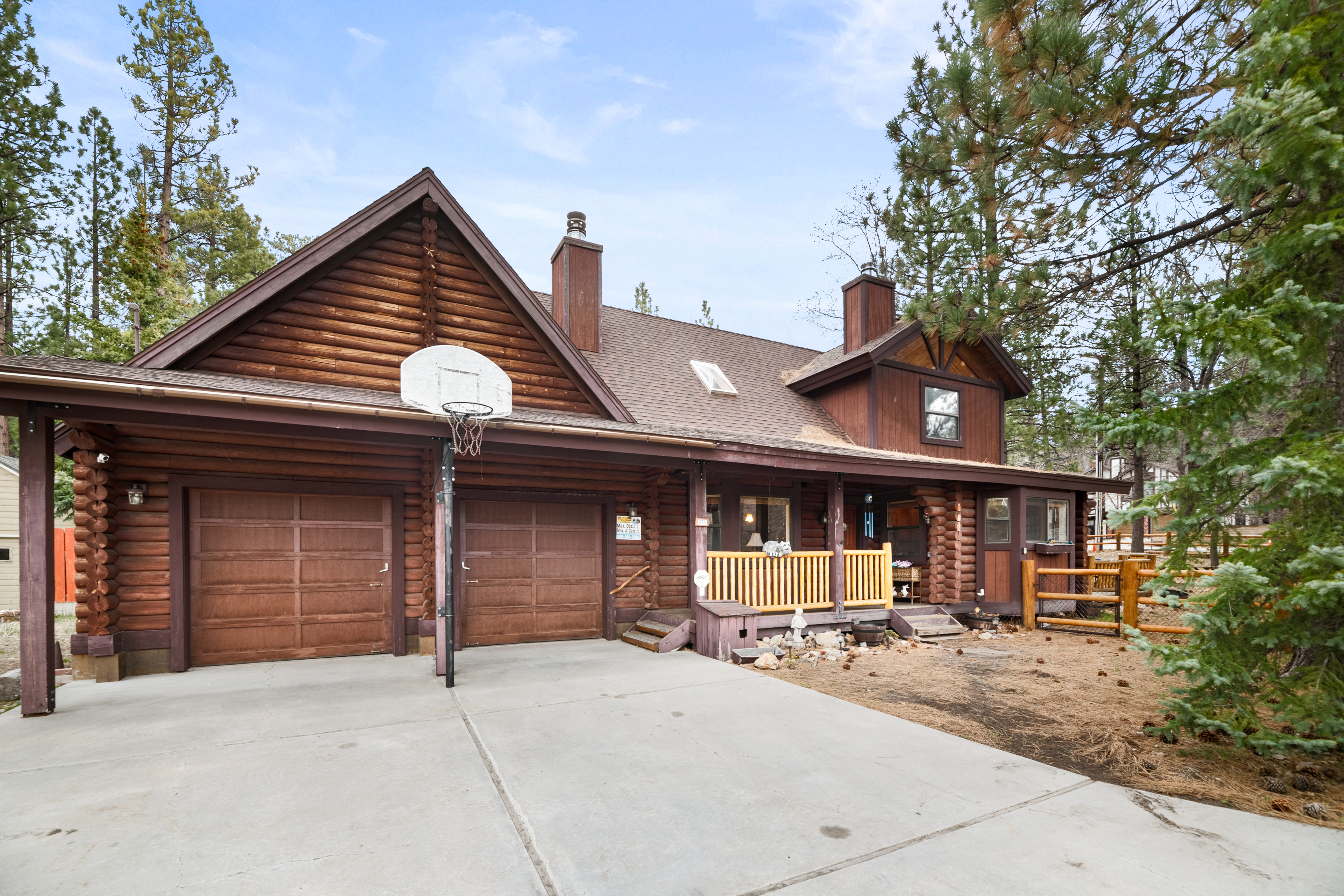 Basketball hoop in the front driveway.