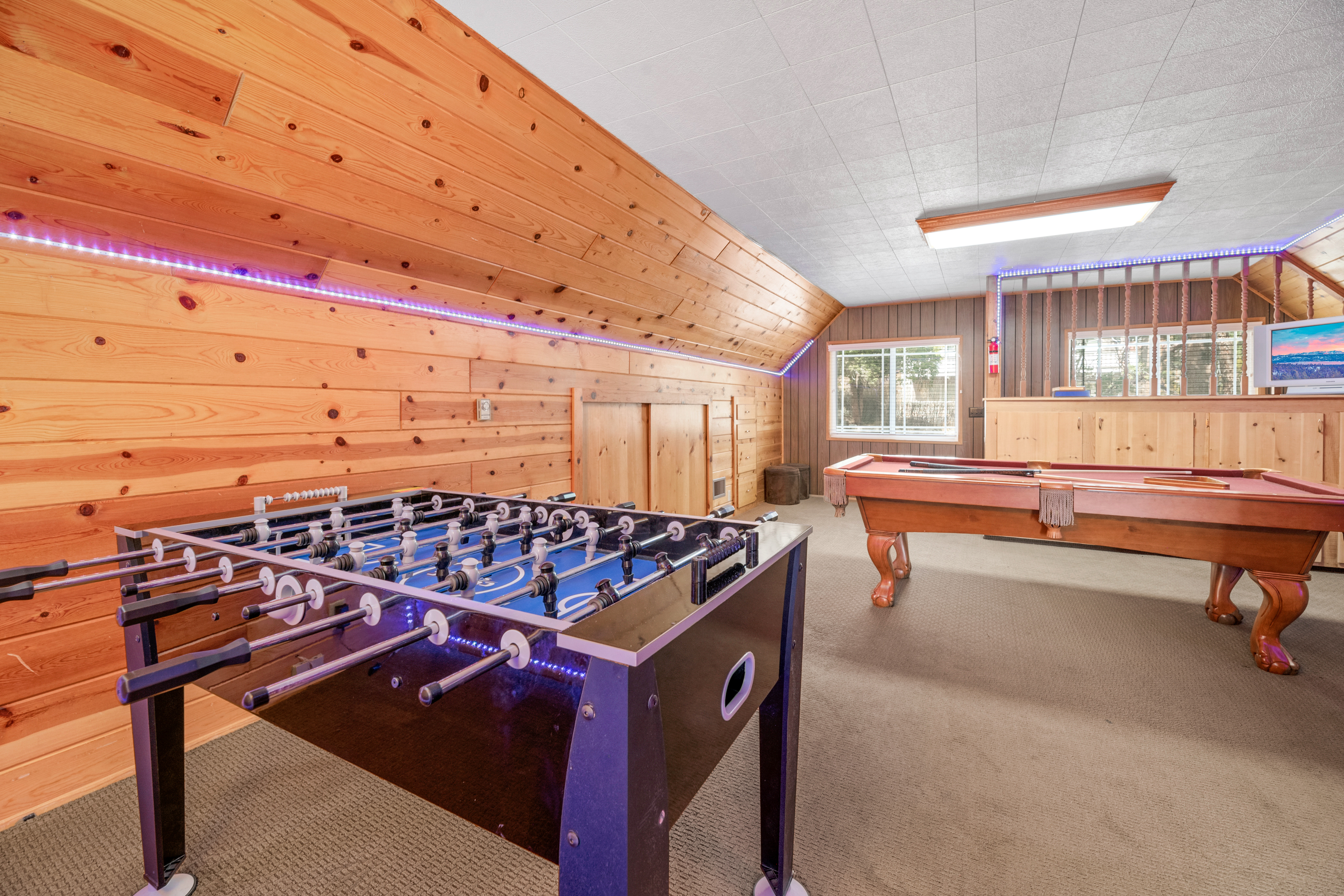 AWESOME Game Room with a Pool Table, Foosball Table, Dart Board and LED lights!