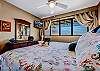 Relax in this king size bed with elegant  coastal living linens
TV and stand up AC for your comfort.