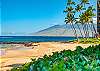 Golden sand beach in front of the Hale Hui Kai.