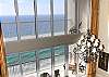 20' floor to ceiling walls of glass - first and second floor balconies