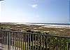 view of railing and ocean