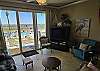 Living Room walks out to pool and beach. 