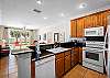 Fully Equipped Kitchen open to Living Room