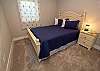 Basement bedroom with queen bed and full bathroom Basement bedroom with queen bed and full bathroom
