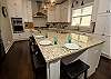 Full kitchen with a double oven Full kitchen with a double oven