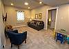 Basement living area with a kids corner and sleeper sofa Basement living area with a kids corner and sleeper sofa