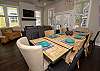 Main level open living, kitchen and dining room, dining seats to Main level open living, kitchen and dining room, dining seats to