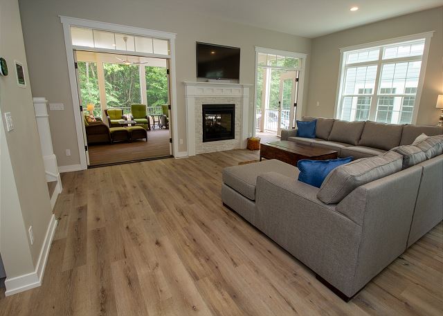 living room opens to large screening in porch for more entertain living room opens to large screening in porch for more entertain