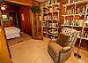 Library attached to bedroom with queen bed Library attached to bedroom with queen bed