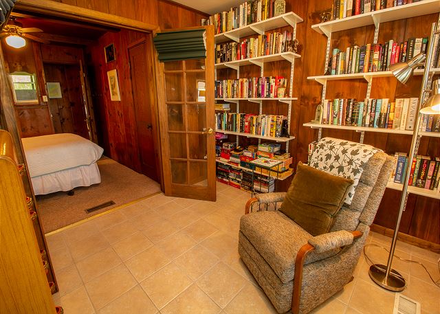 Library attached to bedroom with queen bed Library attached to bedroom with queen bed