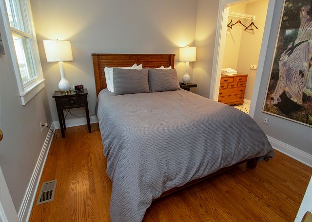 Guest House queen bedroom with walk through closet to attached f Guest House queen bedroom with walk through closet to attached f
