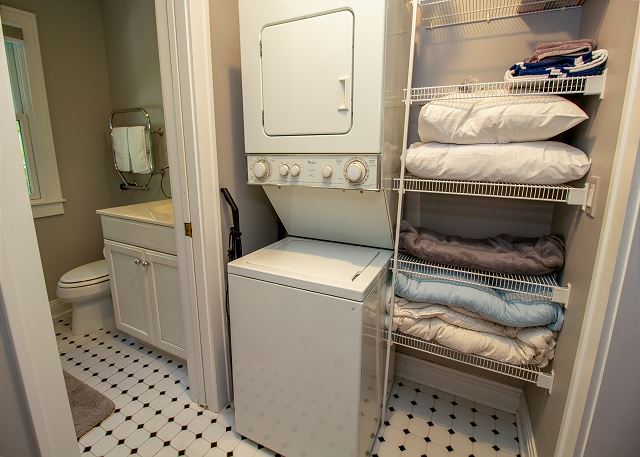 Guest House walk through closet with washer and dryer to the ful Guest House walk through closet with washer and dryer to the ful