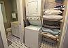 Guest House walk through closet with washer and dryer to the ful Guest House walk through closet with washer and dryer to the ful