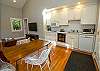 Guest House main living area with dining and kitchen Guest House main living area with dining and kitchen
