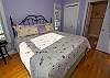 Main level queen bed with attached 3/4 bathroom Main level queen bed with attached 3/4 bathroom