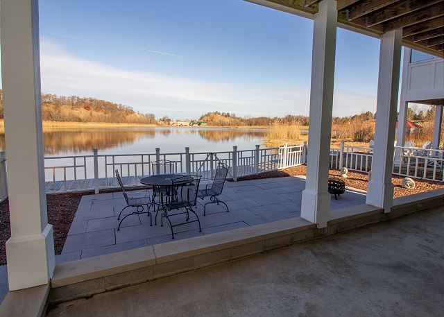 Ground level back patio with a view of Lake Kai Ground level back patio with a view of Lake Kai