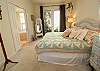 Main level master king bedroom with attached full bathroom Main level master king bedroom with attached full bathroom