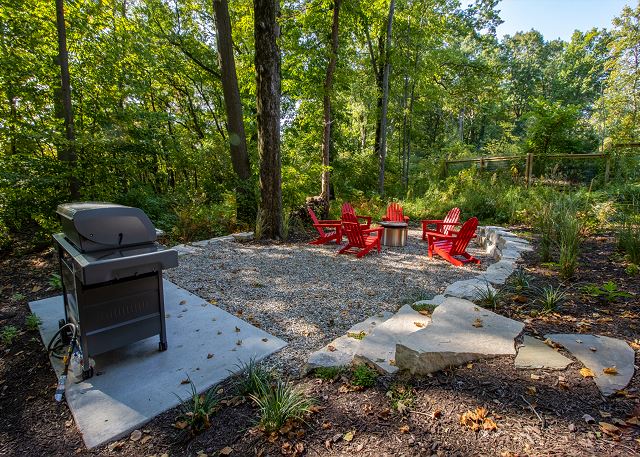 Back patio with gas grill and fire pit