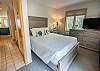 Main level bedroom #1 - queen bed with private deck Main level bedroom #1 - queen bed with private deck