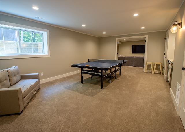 Basement level ping pong table and wet bar