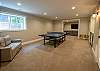 Basement level ping pong table and wet bar