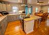Main level full kitchen with deck access Main level full kitchen with deck access