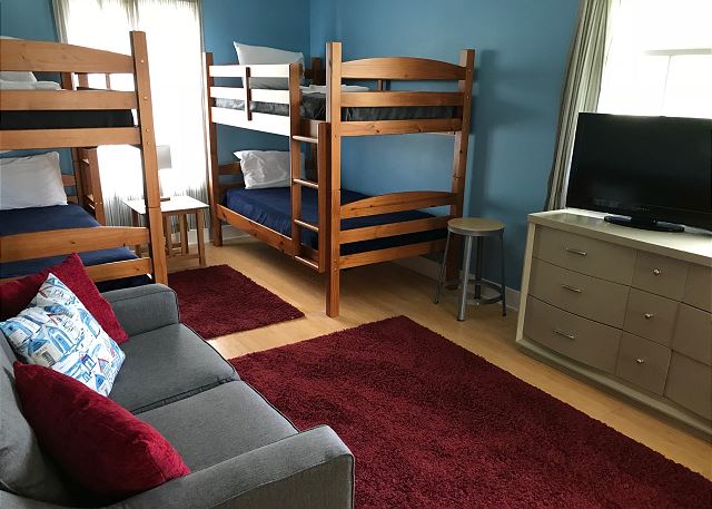 Bedroom 2: Four Twin over Twin Bunk Beds with Sofa
