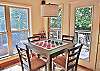 Family Room high-top table with 4 chairs for additional dining or playing games