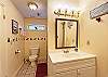 Ground Level Jack-N-Jill shared Bath is accessed from the large multi-Bed Room and Game Room