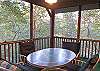 Screen Porch off the kitchen has table and 4 chairs.    Beautiful, private wooded setting.
