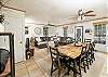 Lower Level Living/Dining Area and Kitchen.  Dining table with seating for 8
