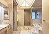 ...Huge Master Bath with walk-in shower, jetted tub, two vanity areas