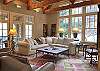 Family Room is a grand space, with cathedral ceiling and exposed White Pine beams.