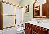 Full Bathroom in Lower Level Hall with combination Tub/Shower.  