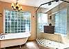 Beautiful Claw Foot tub and Bright Walk in Shower
