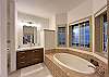 Master Bath has a separate tub and walk-in shower