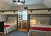 Upper Level Bedroom with 2 Queen Beds and 2 Twin Upper Bunks.  This bedroom shares a Jack-N-Jill Full Bath with Queen Bedroom 1.