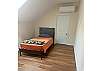 7th Sleeping Room has Twin Bed and small desk area.
