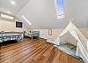Bonus room with 2 single beds and teepee playhouse