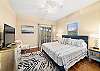 Main Level Bedroom 2 - King Bed, access to Screened Porch.  