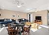 Upper Level Game Room has two trundle beds (4 twin beds total), poker table, shuffleboard game, TV area.  This room also connects to the Jack-N-Jill Bath