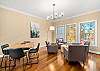 Sitting Room off the Great Room has a card/game table that provides an additional 4 dining seats.