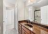 Jack-N-Jill Bath has combination tub/shower (this bath shared by upper level sleeping/game room areas and Bedroom 4) 